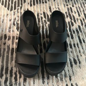 Melissa waterproof wedges. Black in color. Excellent condition.